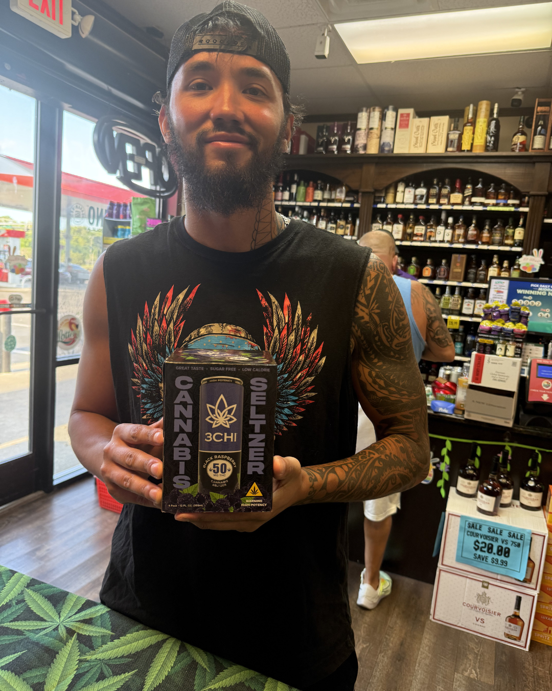 Brand ambassador holding 3CHI cannabis seltzer